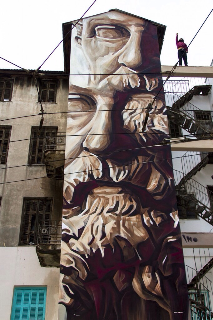 “System of a Fraud” New Mural by iNO in Athens