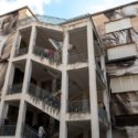 “Waiting” by Guido van Helten in Ragusa, Italy